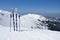 Skis, ski poles and Giewont in Tatra mountains