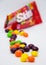 Skittles. Bright and appetizing candies - skittles. Openned pack with skittles in it