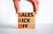 SKO sails kick off symbol. Concept words SKO sails kick off on wooden blocks. Beautiful white background, businessman hand, copy