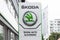 Skoda emblem at one of Skoda`s auto dealerships in Slovakia