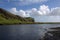 Skoga river and volcanic formation and outwash scenery near Skogafoss waterfall in Iceland