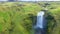 Skogafoss, Iceland`s famous Ring Road waterfall. Aerial drone view of the magnificent natural wonder