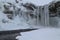 Skogafoss waterfall frozen, a treasure in Iceland