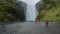 Skogafoss waterfall with tourists visiting in Skogar, south of Iceland