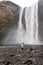 Skogafoss woman