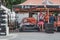 Skradin Croatia June 2020 Multiple people standing in a race car paddock with cars, prepairing the cars for the hill climb race