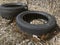 Skrunda, Latvia - May 2, 2022: Old tires left in nature.