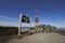 Skrzyczne, Silesian Beskids, Poland - touristic signboard, mountain cabin and communications tower on the top of hill and mountain