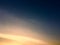 Sky background, golden and blue gradient color with clouds