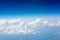 The sky and clouds from the airplane porthole