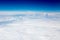 The sky and clouds from the airplane porthole