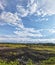 Sky clouds blue sky soil tree fields grass