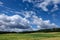 Sky clouds field forest