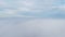 Sky clouds fog. Aerial drone view of blue sky and white clouds. Fog movement