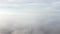 Sky clouds fog. Aerial drone view of blue sky and white clouds. Fog movement