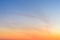 Sky and clouds at sunset, abstract colorful background, orange and blue.