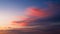 Sky with clouds during sunset. Pink clouds and blue sky. A high-resolution photograph.