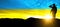 Sky in the colors of Flag of Ukraine with black silhouette of soldier in the sunrise or sunset. Armed forces of Ukraine background