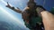 Sky dive tandem over the sea. 4K resolution.