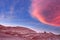 The sky divides beautifully over stone formations in moon valley, Atacama desert, Chile