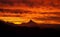 Sky on fire with mordor like volcano at sunset in Nahuel Huapi National Park, Argentina.