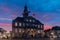 Sky full of drama and amazing colors at the Market square and above the town hall in downtown Maastrichtof