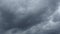 Sky and gray clouds. Puffy fluffy dark clouds. Cumulus cloud cloudscape time lapse. Autumn or winter sky time lapse