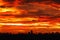 Sky image with a dramatic red clouds after sunset