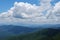 Sky line of blue mountains with dramatic clouds