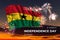 Sky with majestic fireworks and flag of Ghana