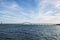 Sky, Ocean, Bridge and Distant Lighthouse