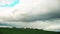 Sky With Rain Clouds On Horizon Above Rural Landscape With Field And Russian Village. Time Lapse, Timelapse, Time-lapse