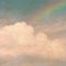 Sky rainbow clouds on a textured, vintage paper background with