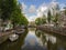 Sky reflected in a typical canal of Amsterdam