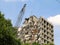 A Sky Scrapper Building Being Demolished