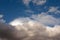 Sky at sunset. Yellow, orange, pinkish multi-colored cumulus clouds