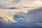 Sky before a thunderstorm with various clouds at sunset