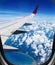 Sky view from the airplane window, this is the high point of view which we will see beautiful clear sky, white clouds, the sea and