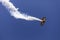 Skyaces plane performing Aerobatics with a smoke trail