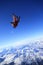 Skydive over snow mountain