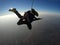 Skydive tandem jump at the sunset