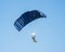 Skydiver activity sport jump on the blue sky background