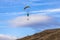 Skydiver On Colorful Parachute In Sky