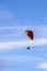 Skydiver On Colorful Parachute In Sky