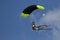 Skydiver coming into land with flag