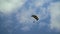 Skydiver flies in the sky
