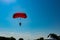 Skydiver jumper is landing with parachute