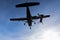 Skydiver jumping from the plane at the sunset