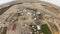 Skydiver parachuting in sky above sands of Arizona. Extreme sport. Height.