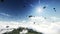 Skydivers flying over the clouds footage